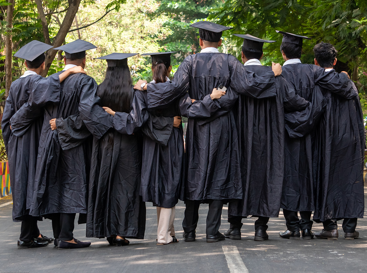 Indian students graduating wearing convocation dress stock photo